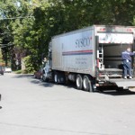 illegally parked delivery truck delivery to goods to business on Bloor Street.